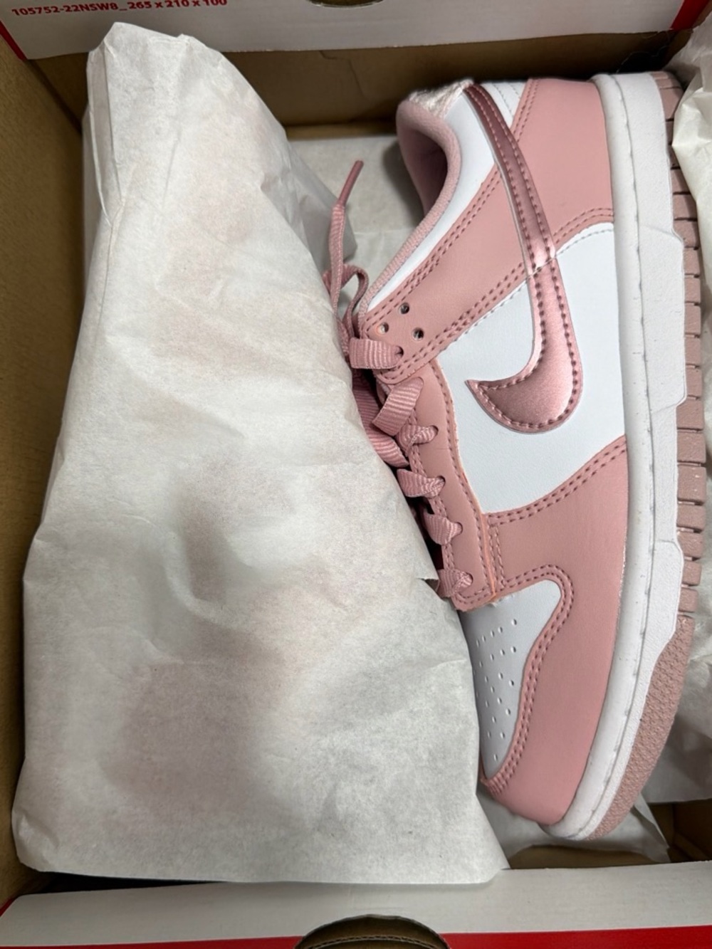Nike Pink and White Low-Top Sneakers with Metallic Swoosh